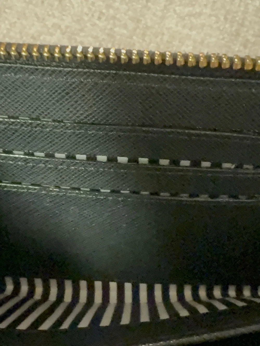 kate spade Black Zip-Around Wallet with Gold Logo